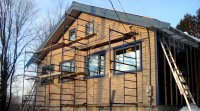 Installing siding on a passive solar home