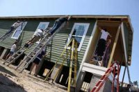 Aux Etats-Unis, travaux collectifs de peinture