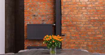 Un murs de briques constitue une bonne masse thermique