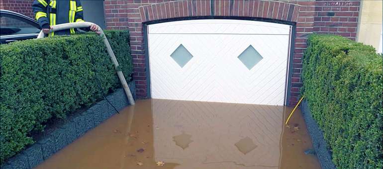 Porte de garage anti-inondation pour protection contre les inondations  Aggeres